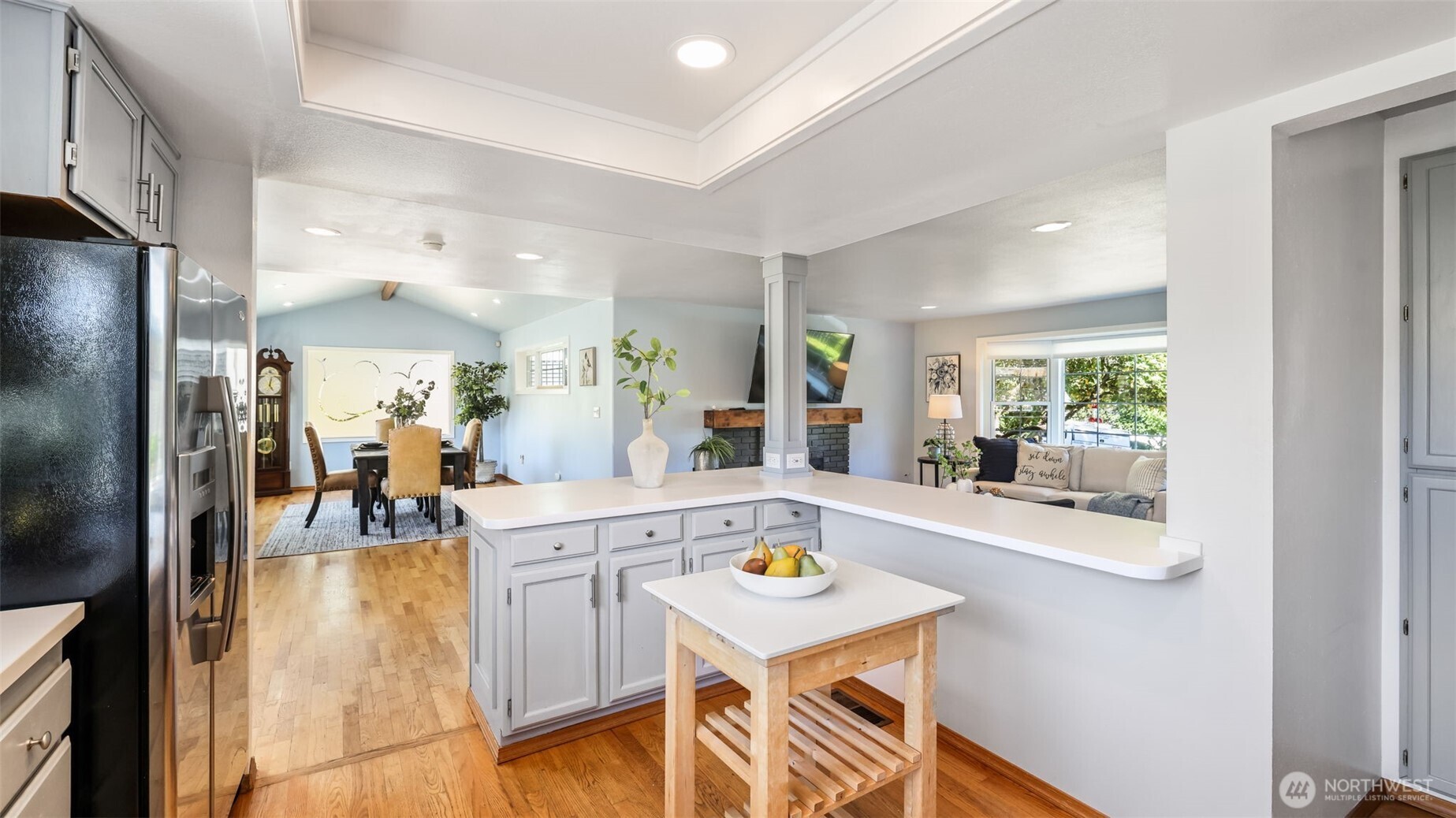 13735 Southeast 172nd Street Renton, WA 98058 - Photo 7 of 29 a view of a kitchen area with furniture and a window