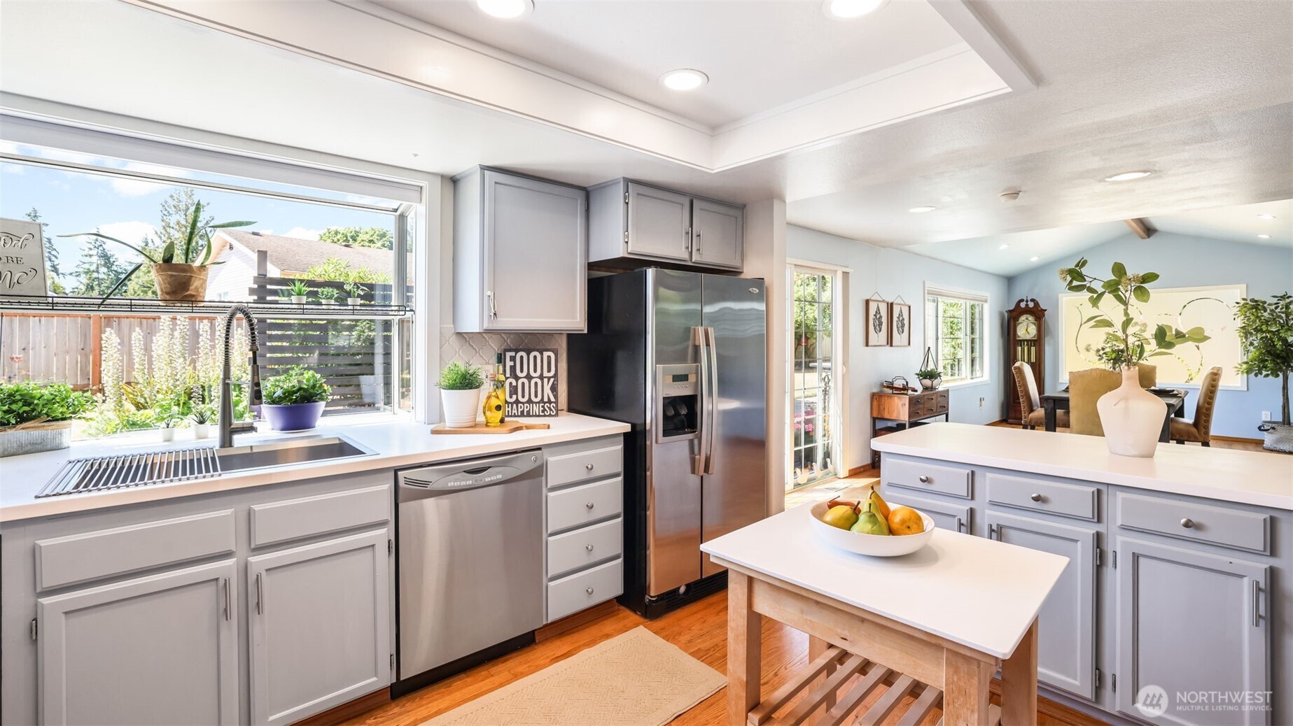 13735 Southeast 172nd Street Renton, WA 98058 - Photo 8 of 29 a kitchen with a sink refrigerator and window