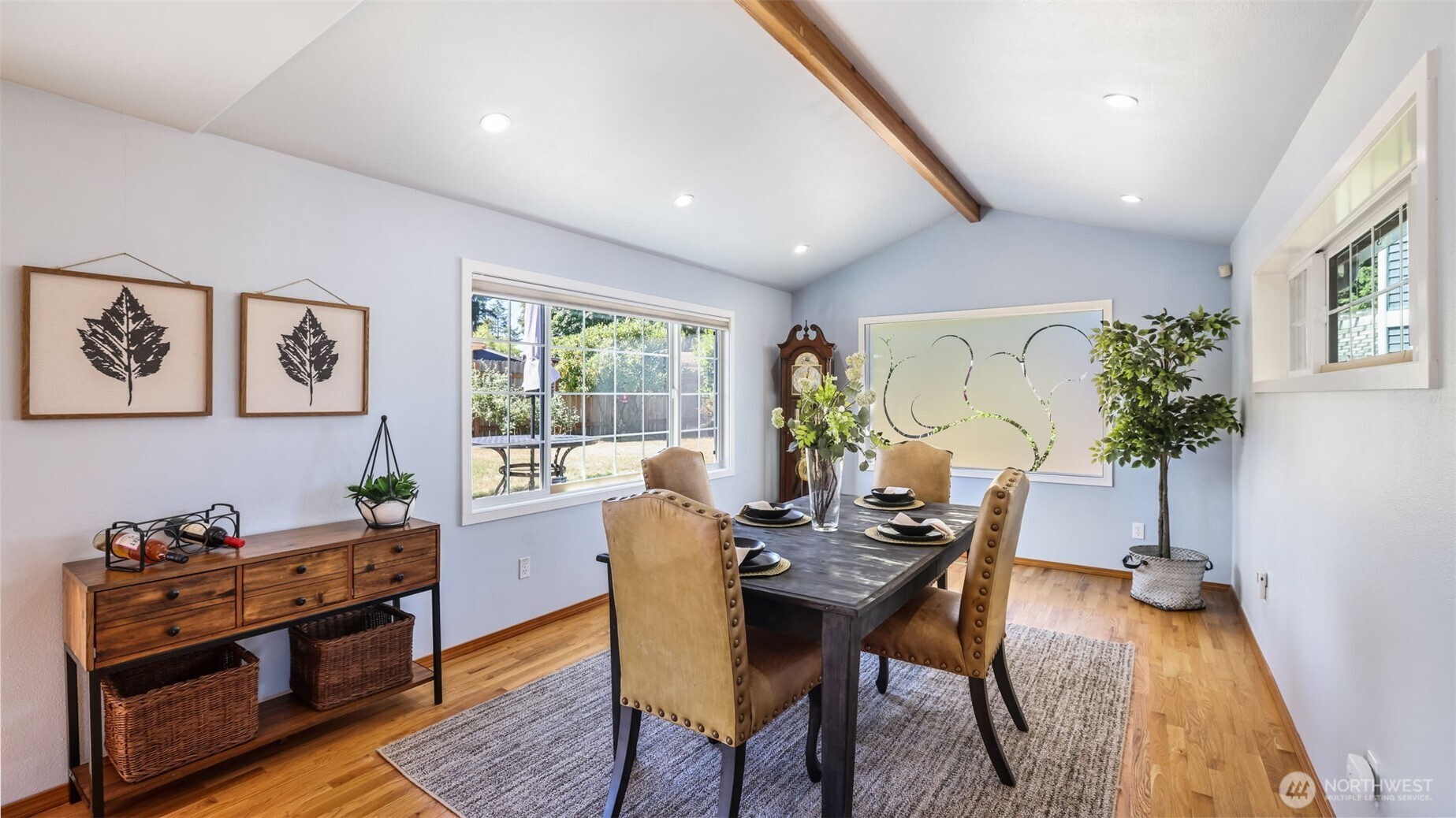 13735 Southeast 172nd Street Renton, WA 98058 - Photo 10 of 29 a view of a dining room with furniture window and wooden floor