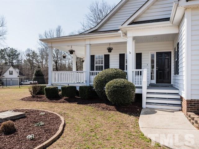 1232 Jogging Court Raleigh, NC 27603 - Photo 3 of 25 a front view of a house with garden