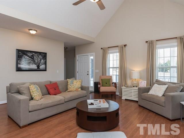 1232 Jogging Court Raleigh, NC 27603 - Photo 5 of 25 a living room with furniture and a large window
