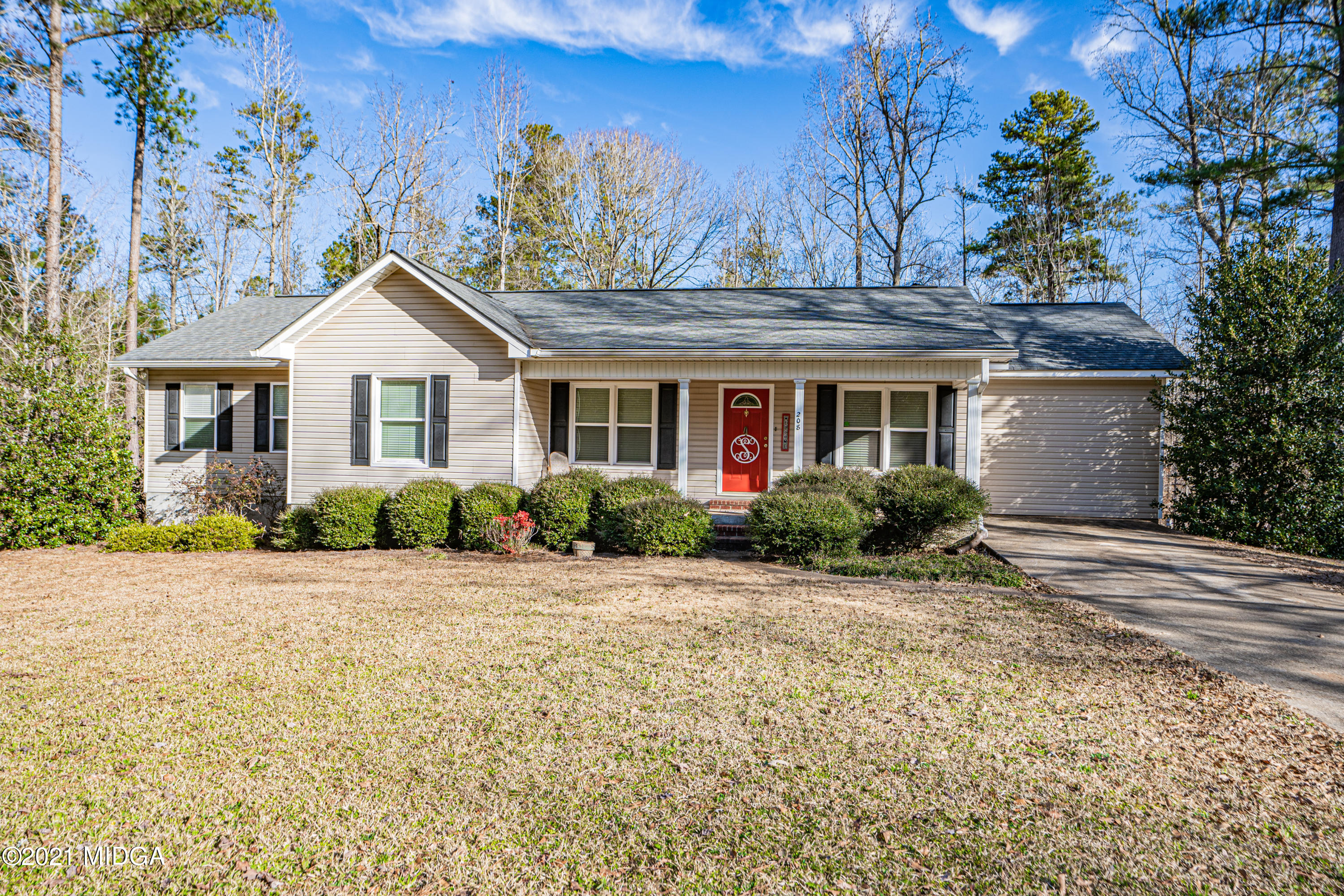 208 Camelot Road Gray, GA 31032 - Photo 1 of 41 a front view of a house with a yard