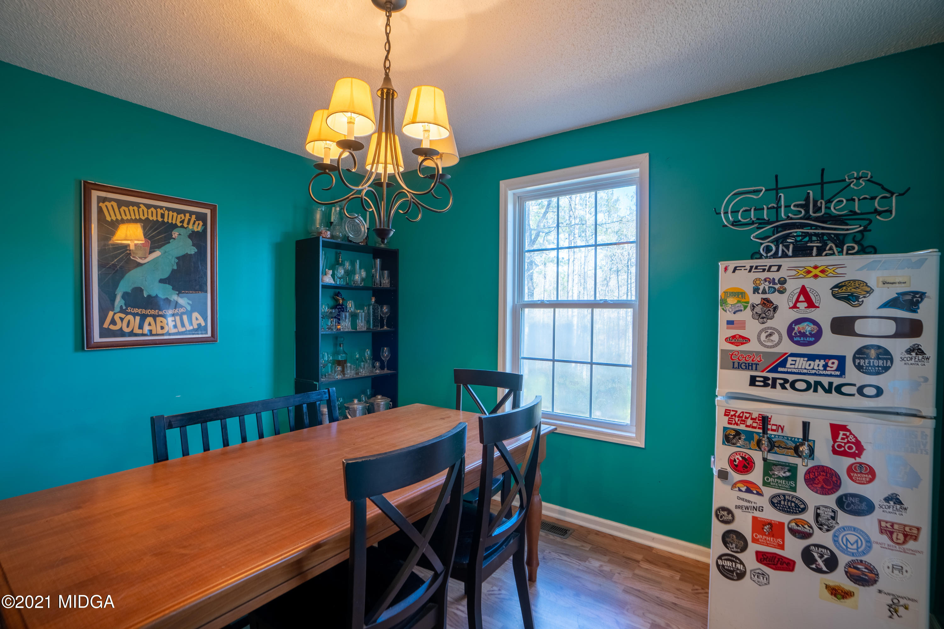 208 Camelot Road Gray, GA 31032 - Photo 10 of 41 a view of a dining room with furniture window and wooden floor