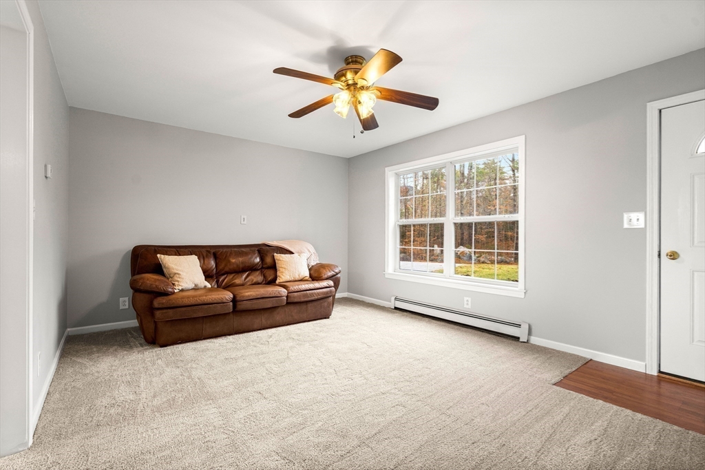 454 Little Pond Road Sandwich, NH 03227 - Photo 14 of 38 a living room with furniture and window