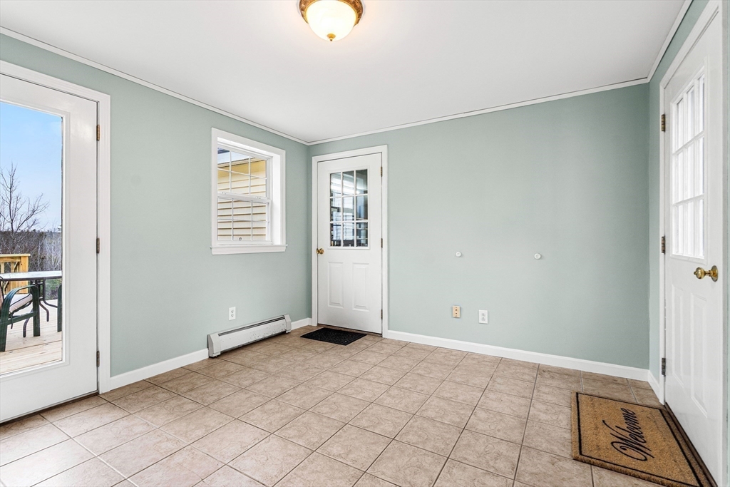 454 Little Pond Road Sandwich, NH 03227 - Photo 24 of 38 an empty room with windows
