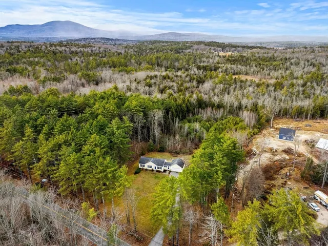 a view of a lake with mountains in the background