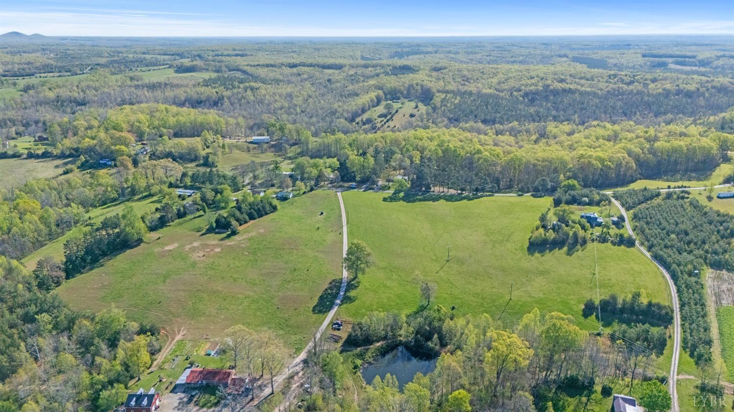 5130 Crumptown Road Farmville, VA 23901 - Photo 4 of 9 an aerial view of residential houses with outdoor space