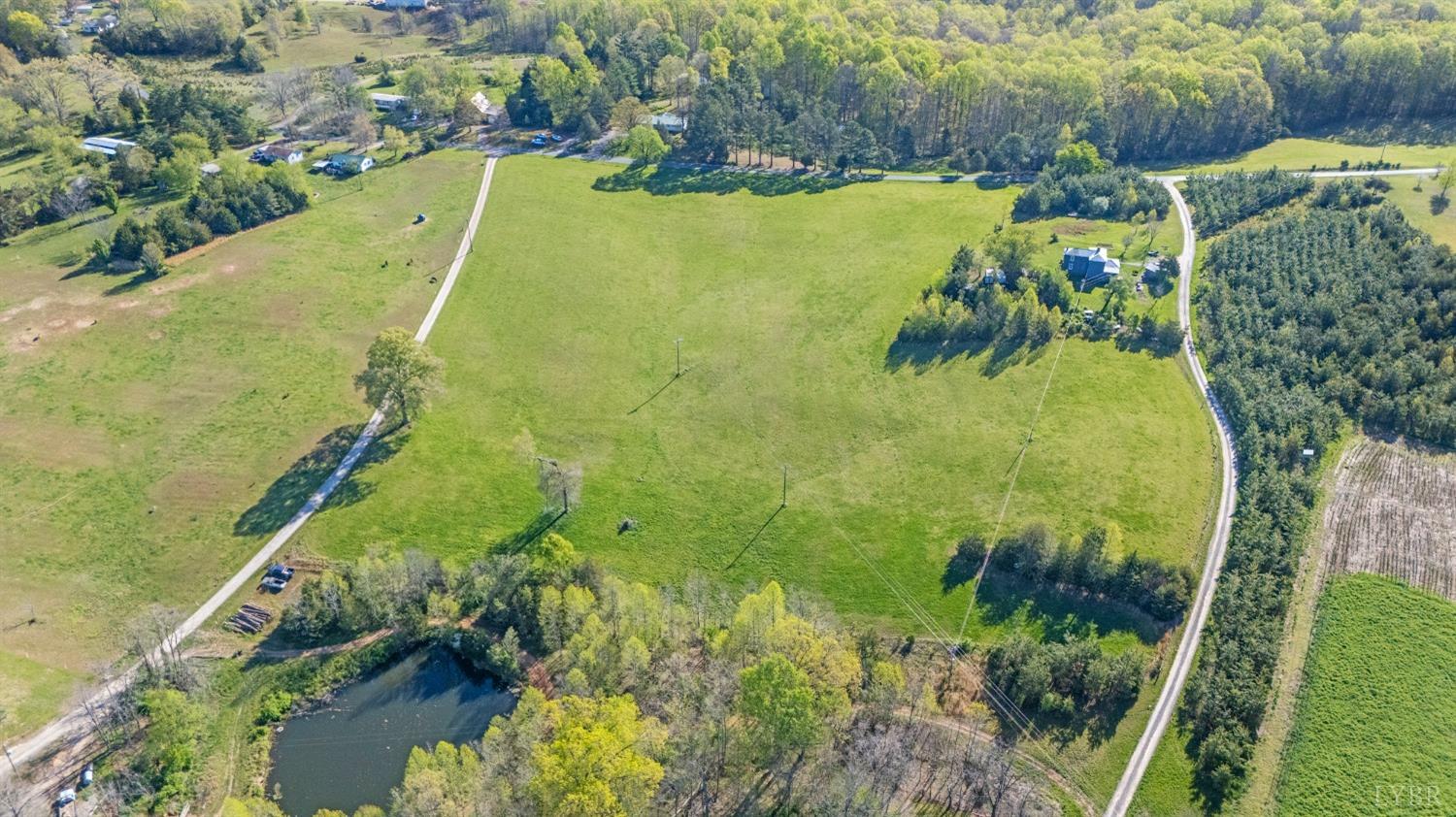 5130 Crumptown Road Farmville, VA 23901 - Photo 6 of 9 a view of a swimming pool and a yard