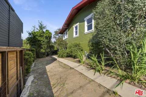 a house view with a outdoor space