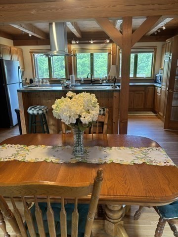 200 Peru Road Windsor, MA 01270 - Photo 24 of 42 a dining table with chairs and window