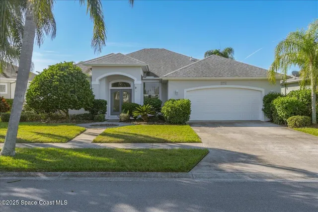 a view of pool with a yard
