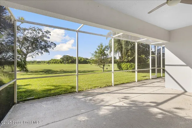 a view of a golf course with a lake