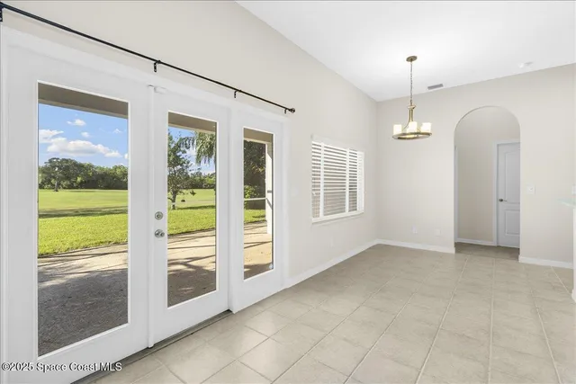 a view of a golf course with a garden