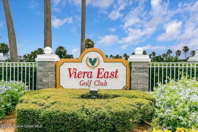 a view of a golf course with a lake