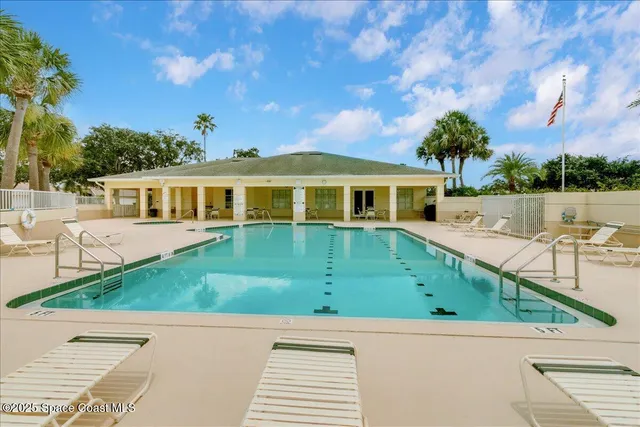 an aerial view of a house with a garden