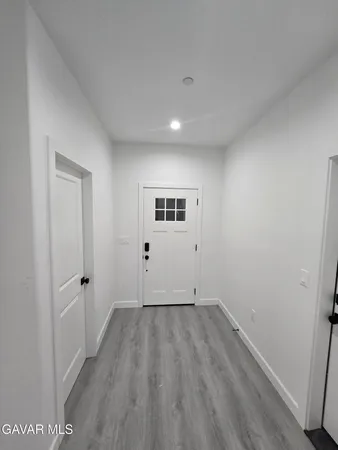 a bathroom with a bathtub a toilet and a shower
