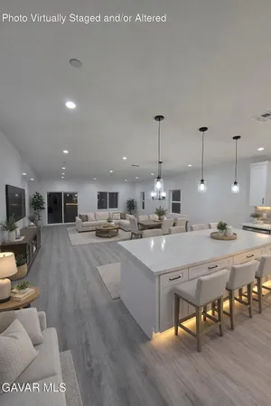a bedroom with a bed and furniture