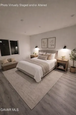 a large kitchen with kitchen island a sink a stove and a refrigerator