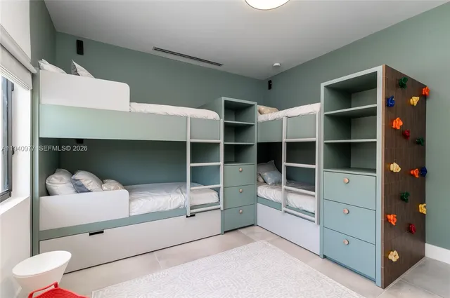 a view of an chairs and tables in the backyard