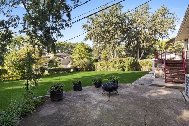 a view of a garden with patio