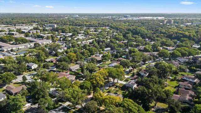 an aerial view of residential building with parking space
