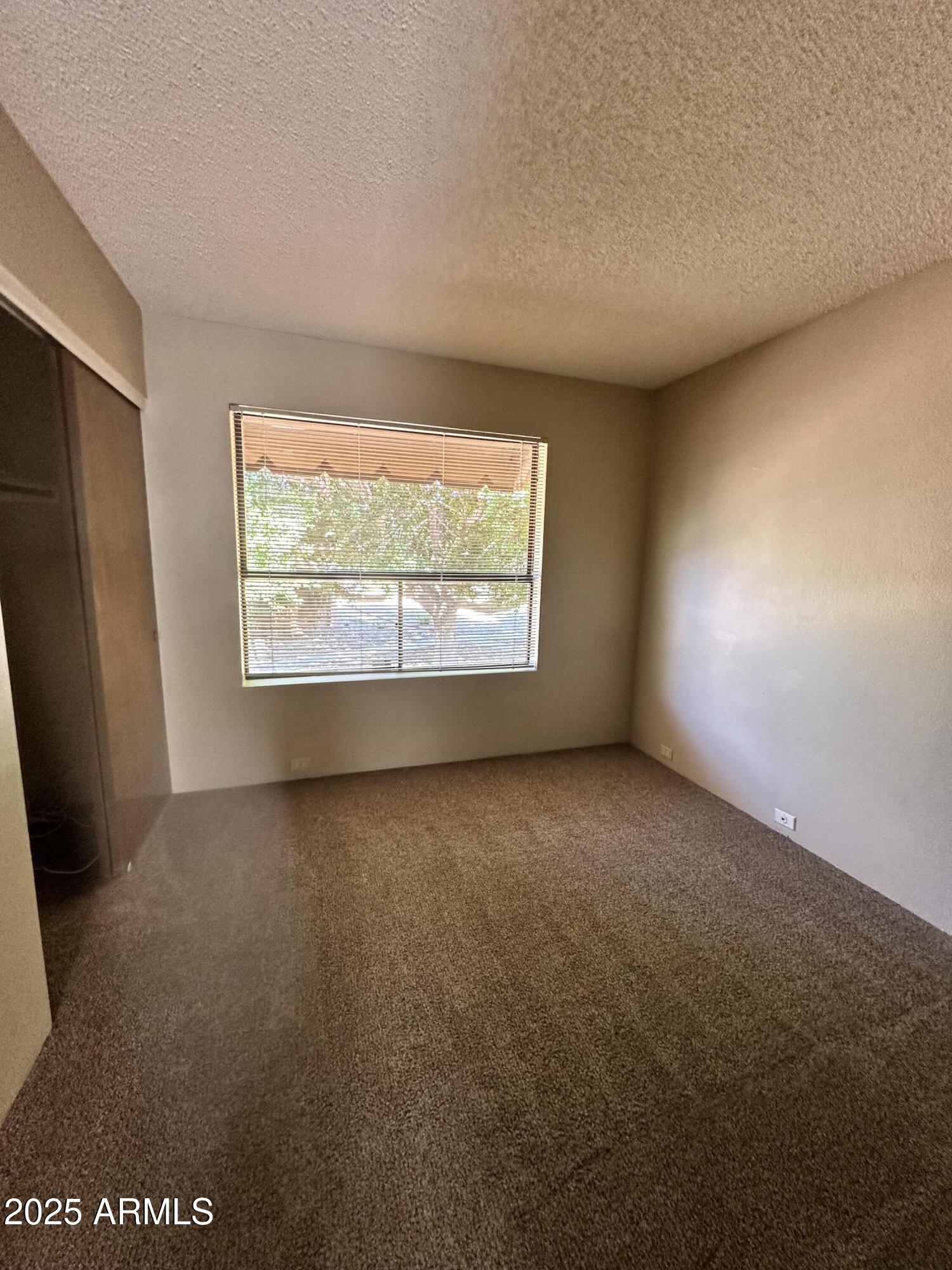 10424 North 11th Place, Unit 2 Phoenix, AZ 85020 - Photo 16 of 41 an empty room with a window