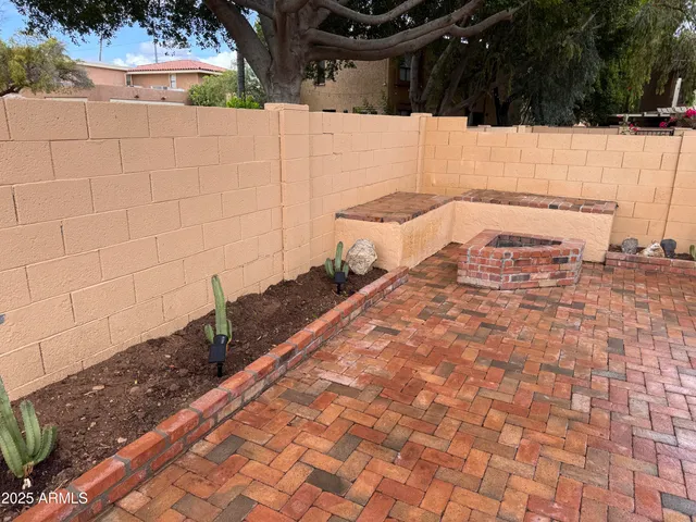 a view of a backyard of the house