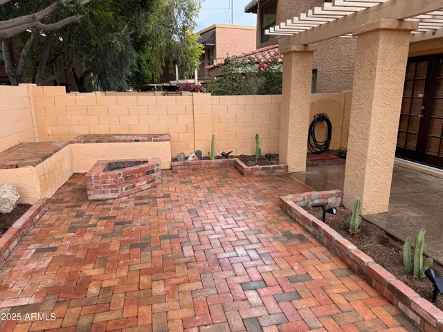 a view of a backyard with plants