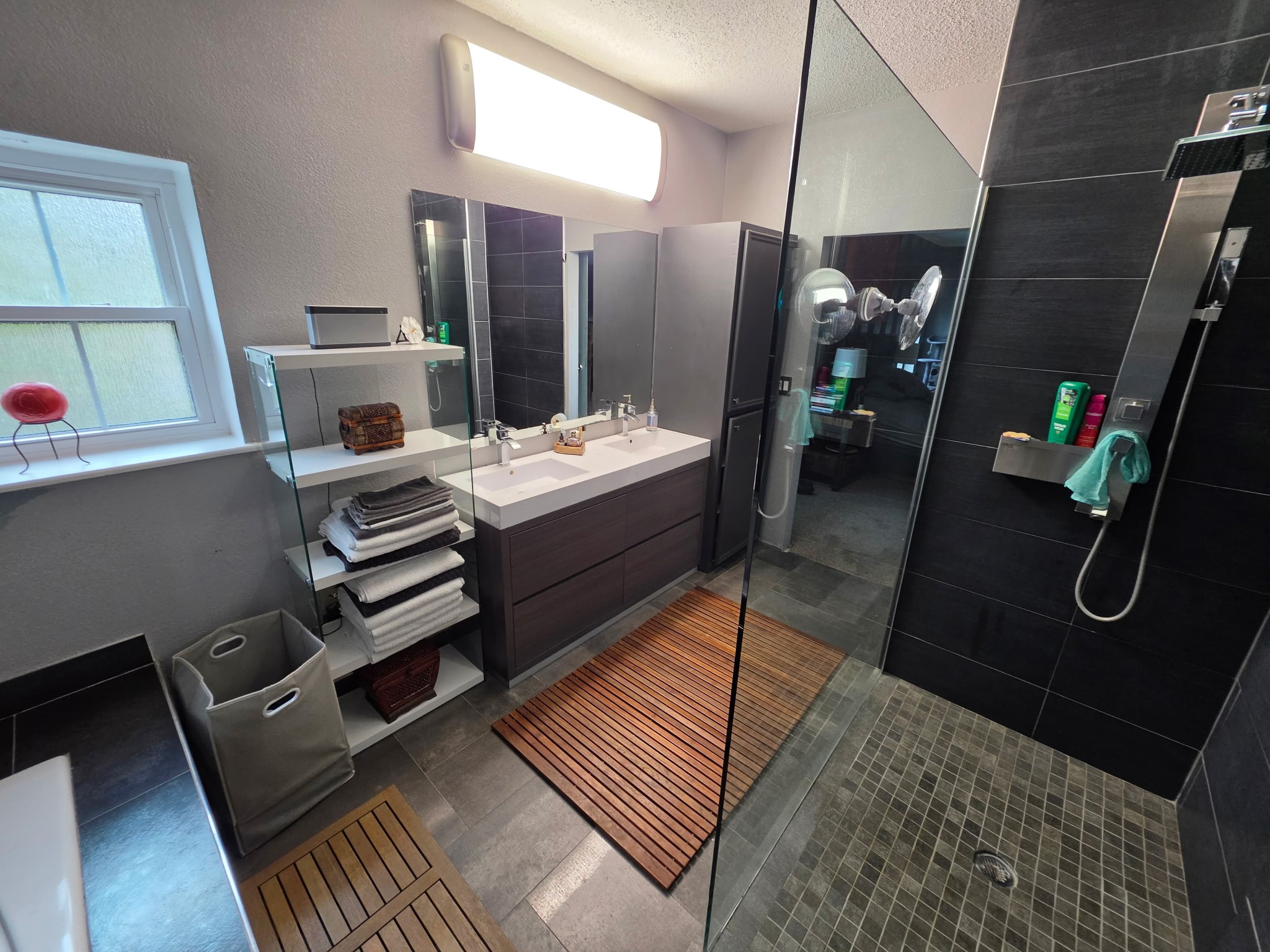 6000 Reims Road, Unit 3601 Houston, TX 77036 - Photo 11 of 13 a bedroom with a bed and a mirror on the dresser