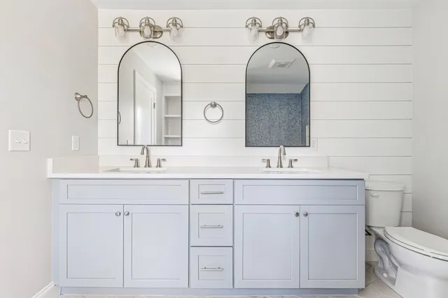 a bathroom with a sink and a toilet