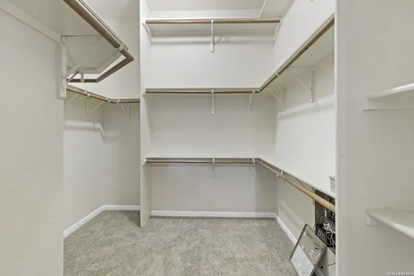 a view of an empty walk in closet