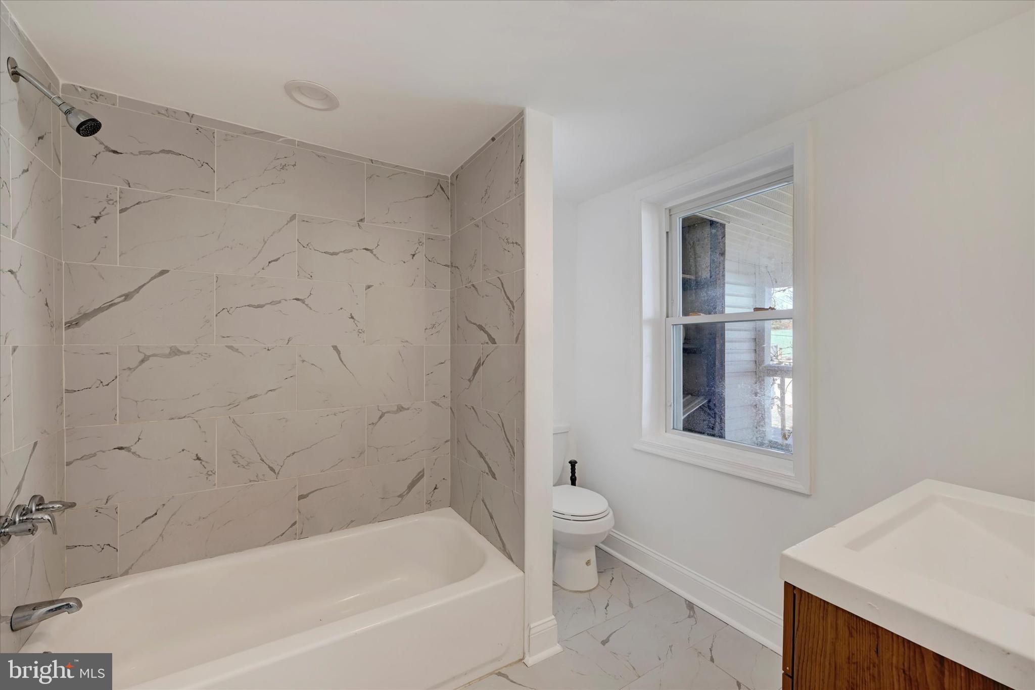 346 East 25th Street Baltimore, MD 21218 - Photo 25 of 31 a bath room with a toilet