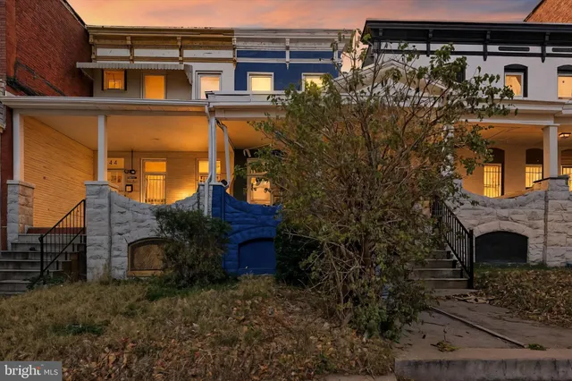 front view of a house with a small yard