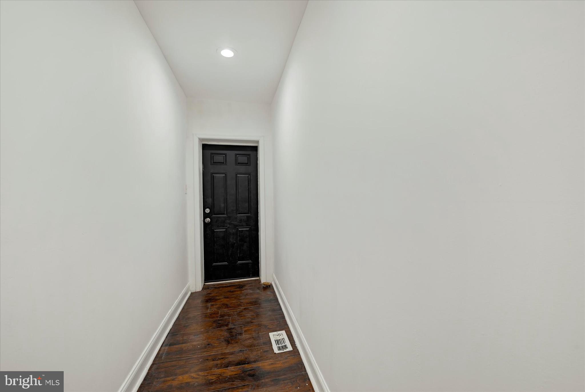 346 East 25th Street Baltimore, MD 21218 - Photo 6 of 31 a view of hallway with stairs