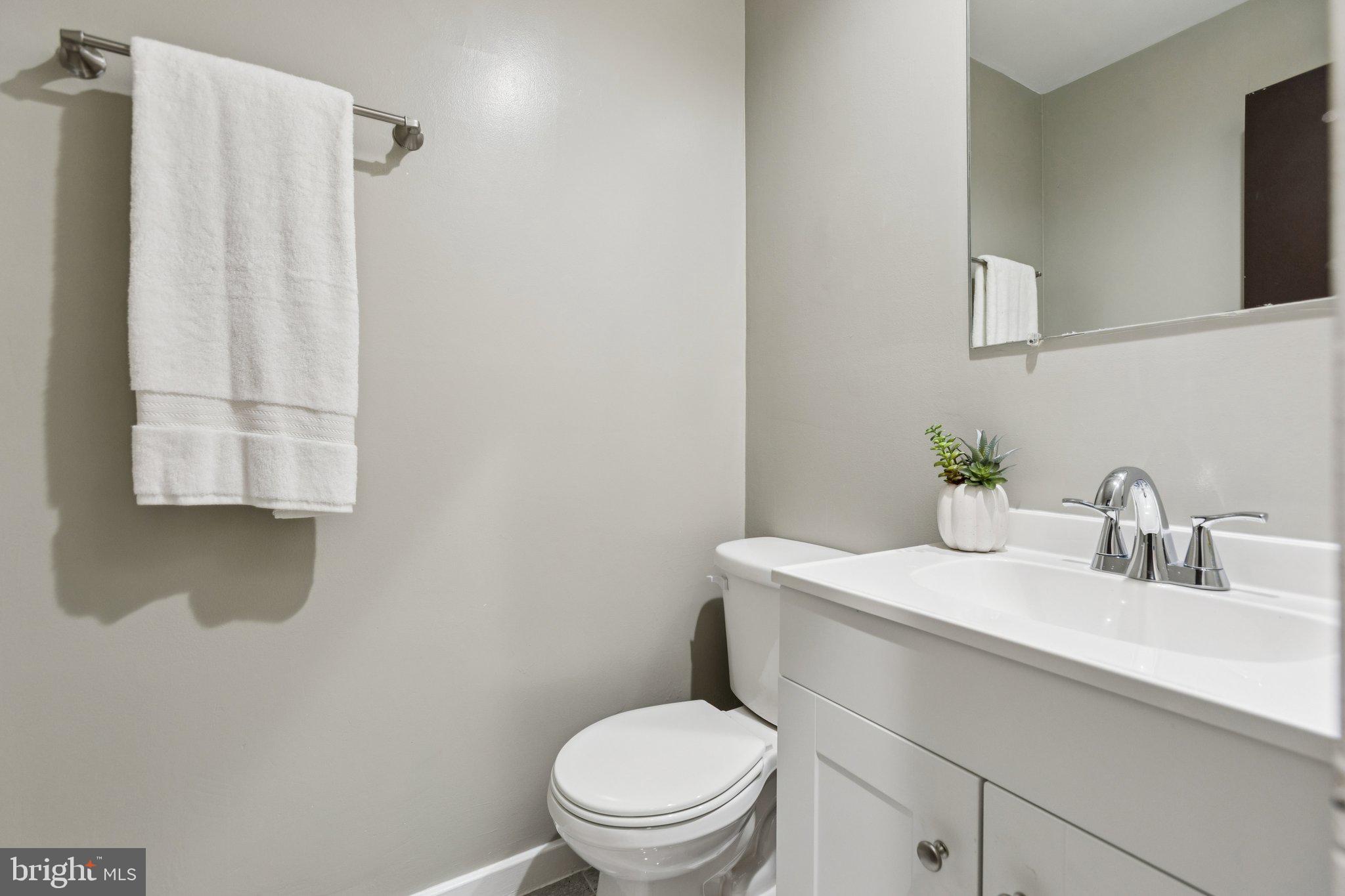 406 15th Street Southeast Washington, DC 20003 - Photo 13 of 39 a bathroom with a sink toilet and shower