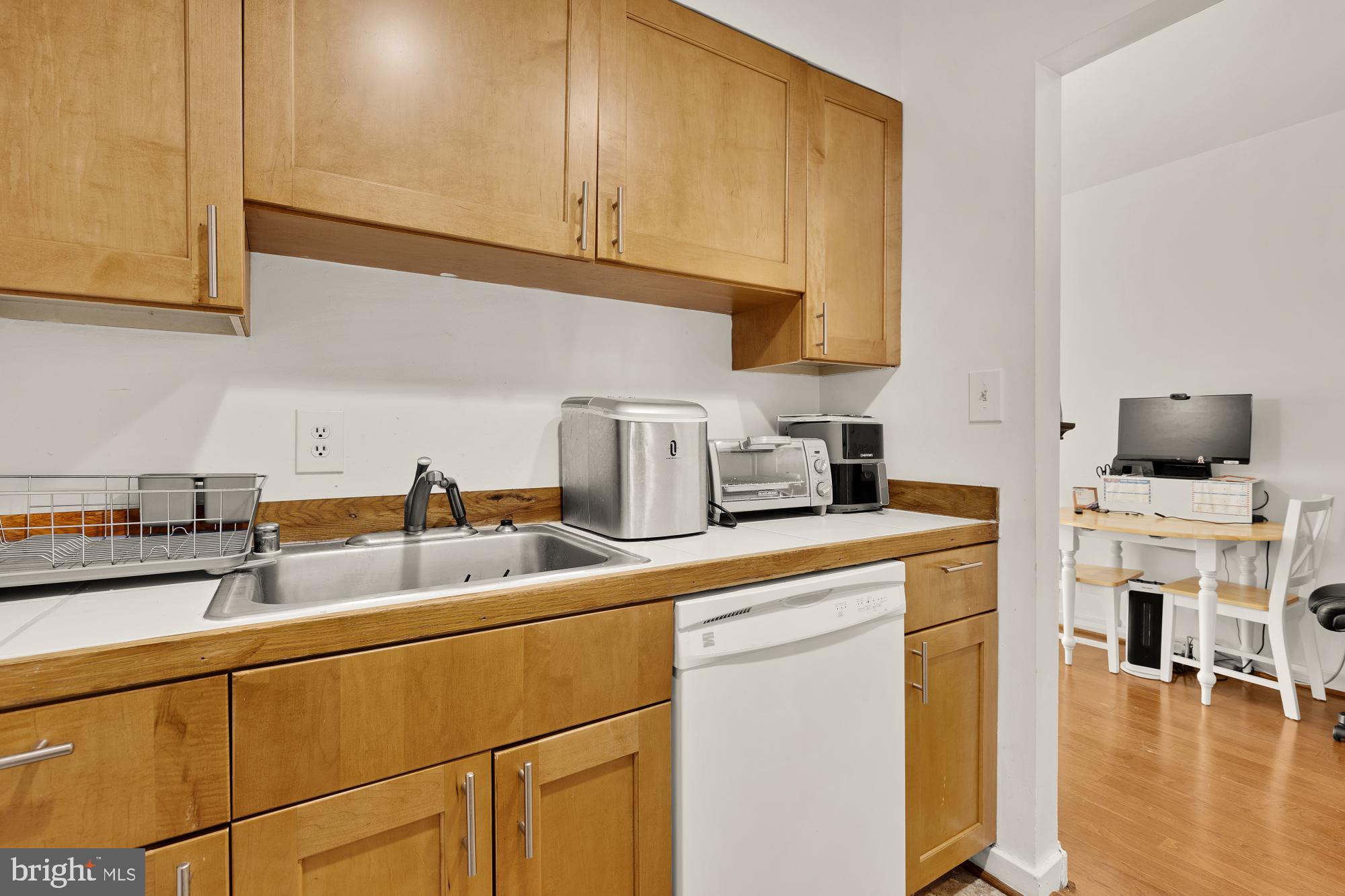 406 15th Street Southeast Washington, DC 20003 - Photo 27 of 39 a kitchen with a sink cabinets and a window