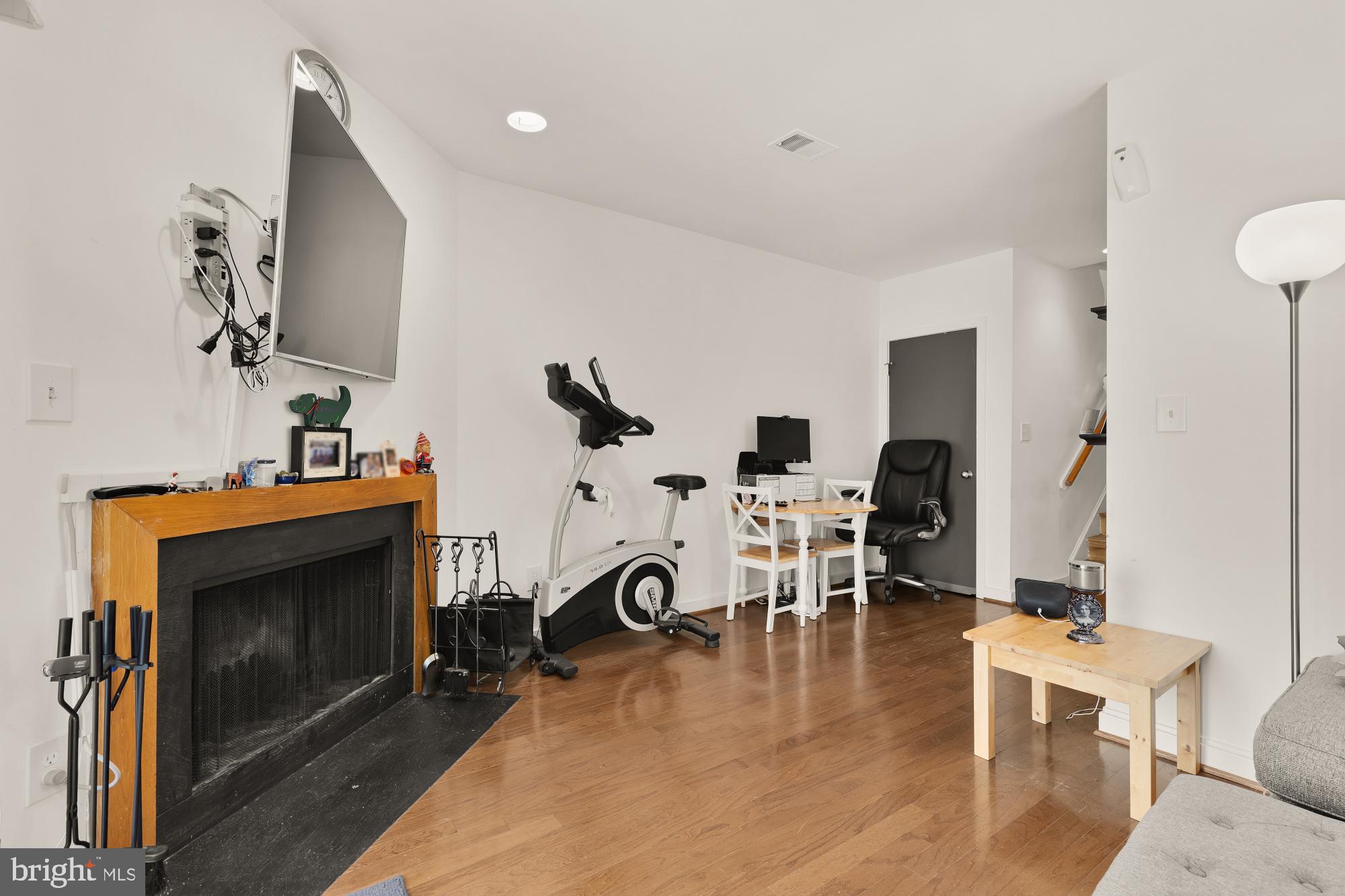 406 15th Street Southeast Washington, DC 20003 - Photo 29 of 39 a view of a livingroom with furniture and a fireplace