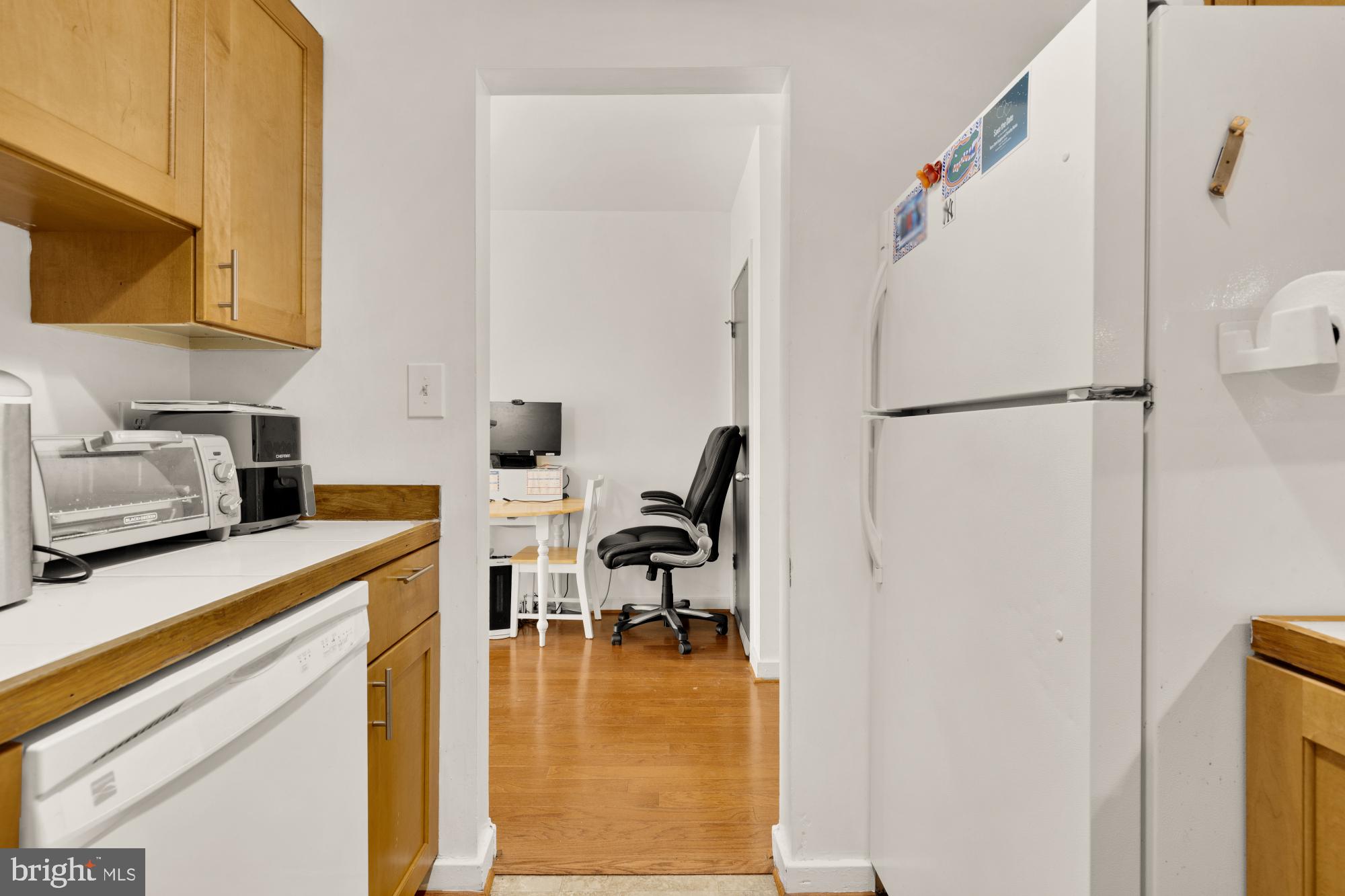 406 15th Street Southeast Washington, DC 20003 - Photo 32 of 39 a kitchen with a refrigerator and a stove