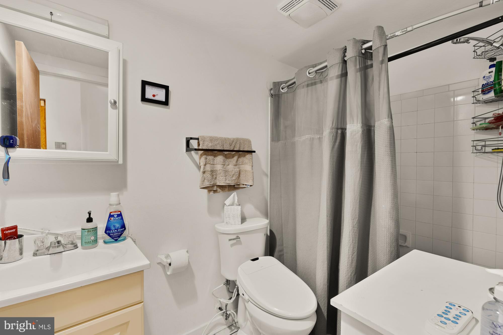 406 15th Street Southeast Washington, DC 20003 - Photo 35 of 39 a white toilet sitting next to a bathroom sink