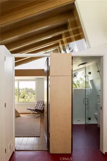 a bathroom with a shower and a toilet