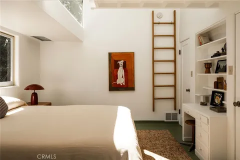 a view of swimming pool from a balcony