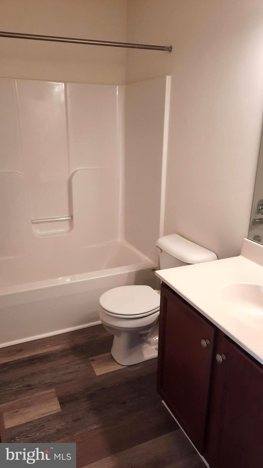 815 Schooner Lane Mechanicsburg, PA 17050 - Photo 12 of 15 a bathroom with a toilet a sink and shower