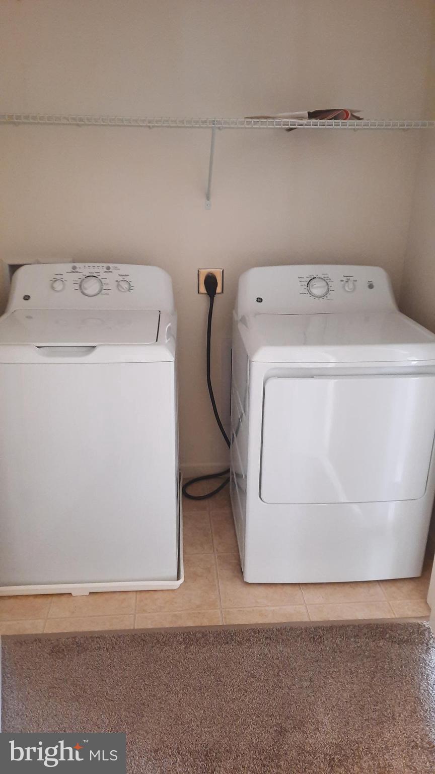 815 Schooner Lane Mechanicsburg, PA 17050 - Photo 13 of 15 a utility room with dryer and washer