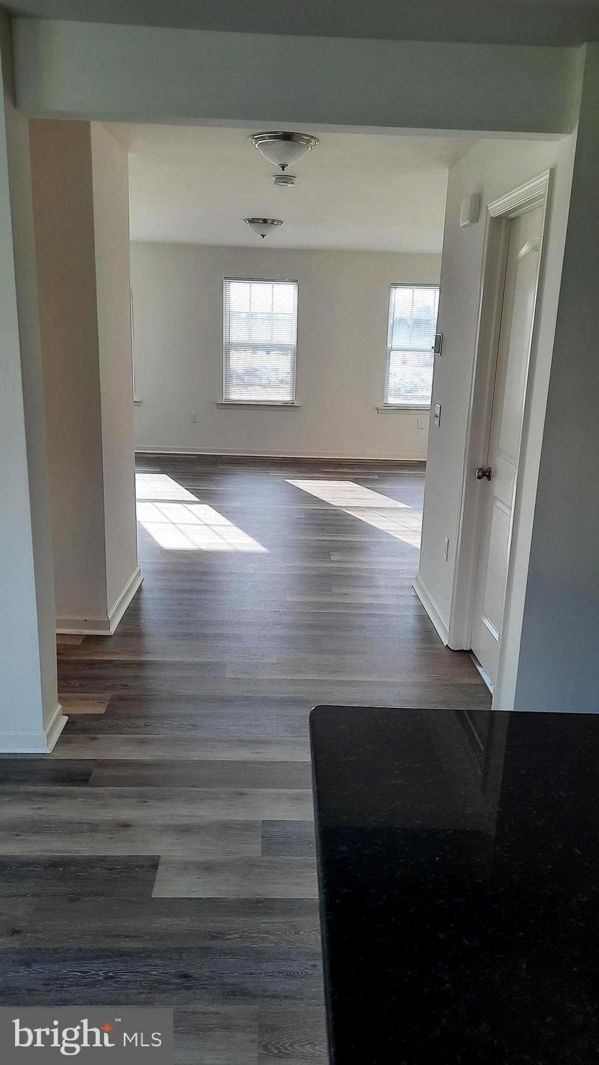815 Schooner Lane Mechanicsburg, PA 17050 - Photo 5 of 15 a view of empty room with window and wooden floor