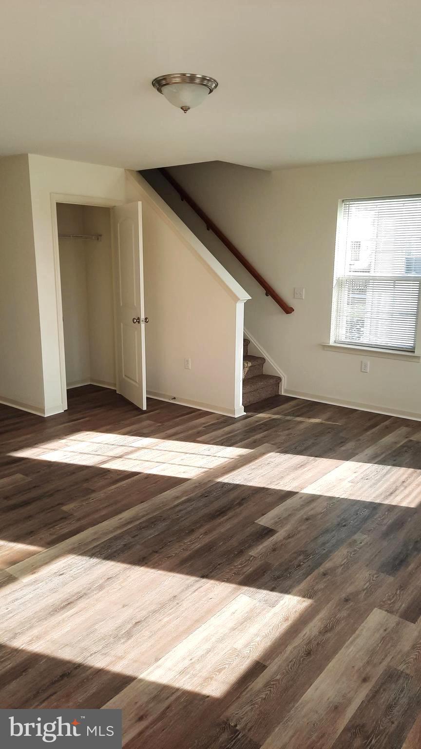 815 Schooner Lane Mechanicsburg, PA 17050 - Photo 6 of 15 a view of a livingroom with wooden floor