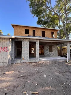 a front view of a house with a garage