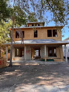 a front view of a house with a garage