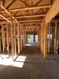 a view of a room with wooden walls