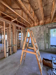 a view of wooden floor with stairs