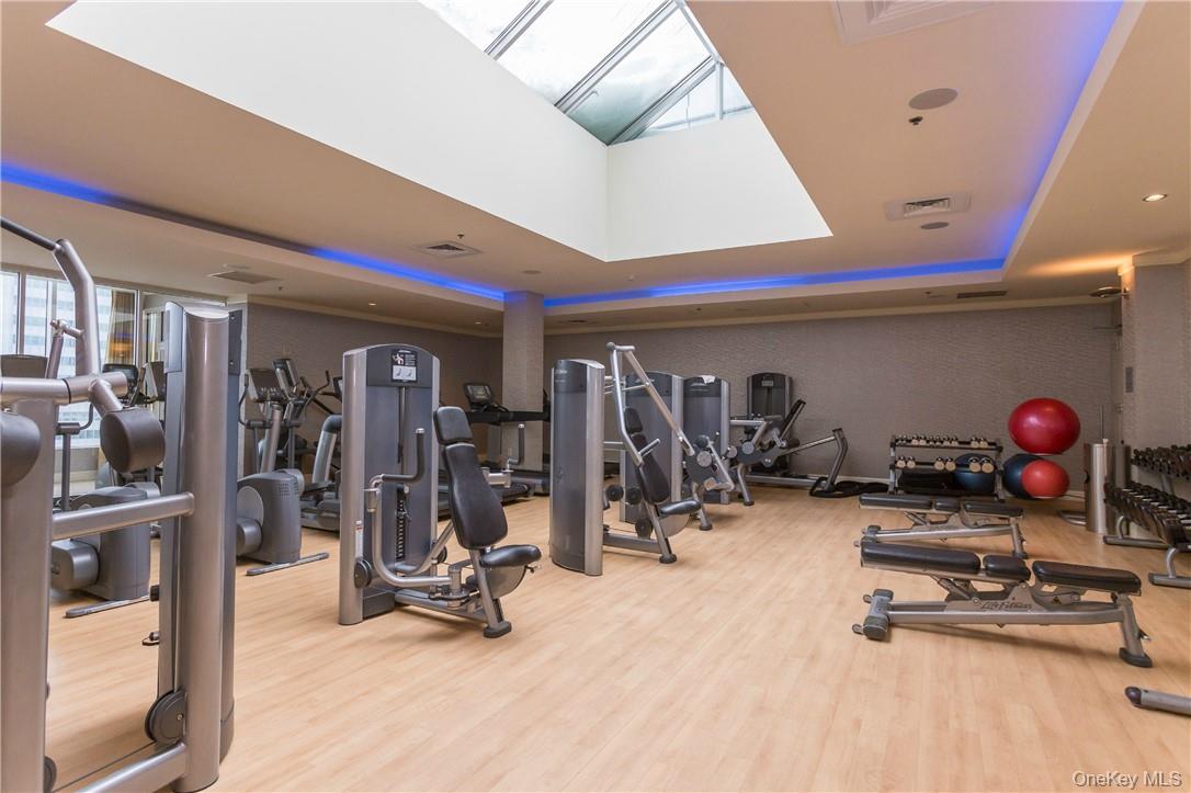 1 Renaissance Square, Unit PH40C White Plains, NY 10601 - Photo 12 of 14 a view of a room with gym equipment